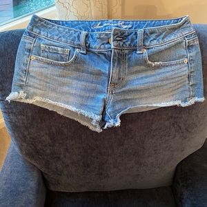 American Eagle sz4  low rise denim shorts, raw hem